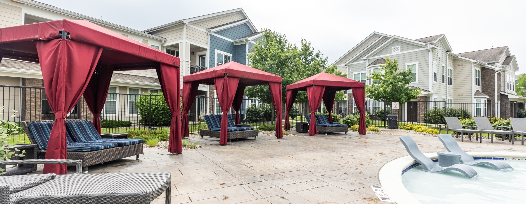 A row of three red cabanas